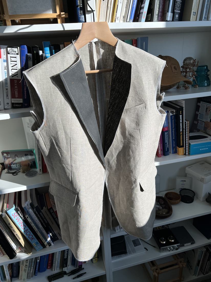 The same body held open, showing the interfacing on both lapels.