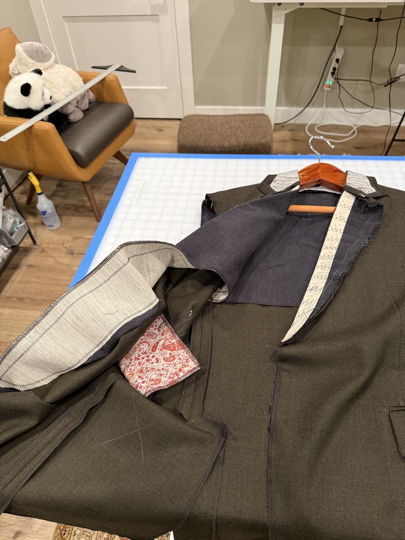 A sleeve turned out showing the lining and interfacing inside.